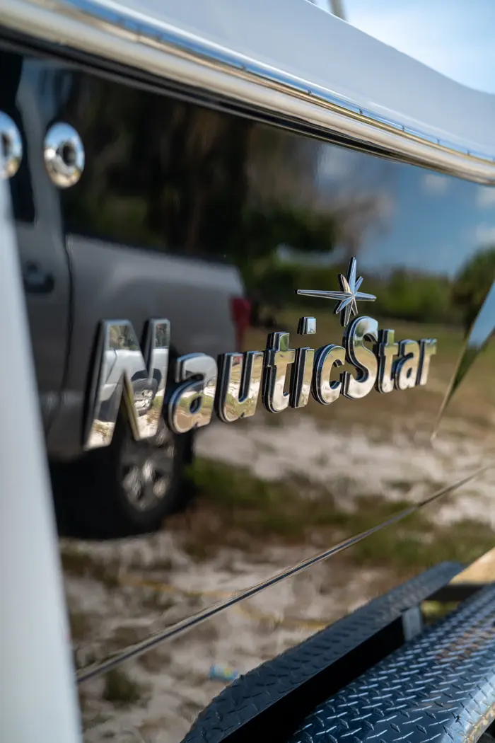 NauticStar hull lettering reflecting cleanly after coating