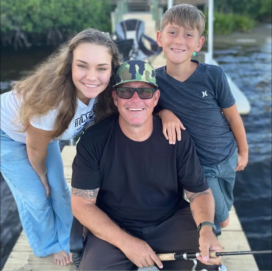 Brian Bowman on the dock with his daughter and son