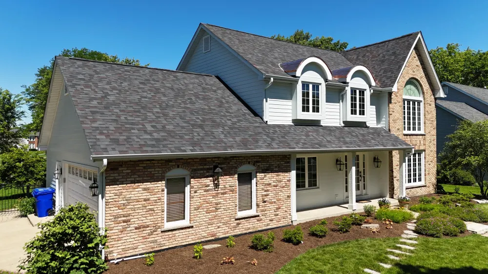 Arctic White James Hardie siding and Malarkey Black Oak roof in Wheaton, IL