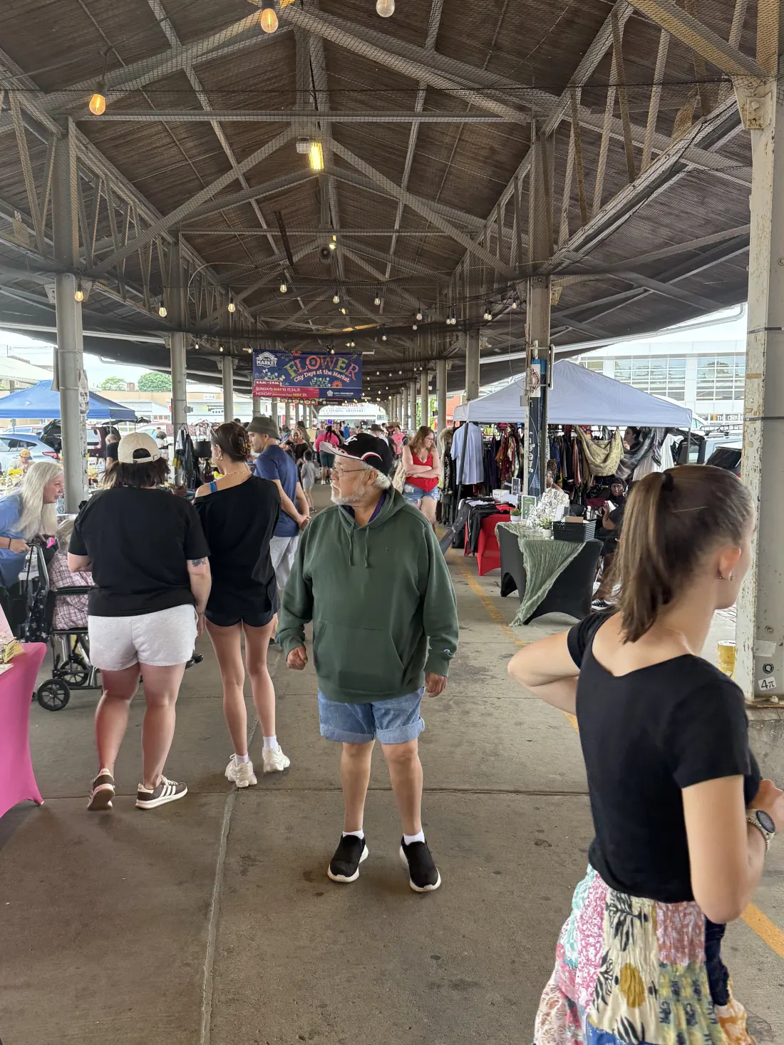 Shoppers exploring the Great NYS Flea market aisles