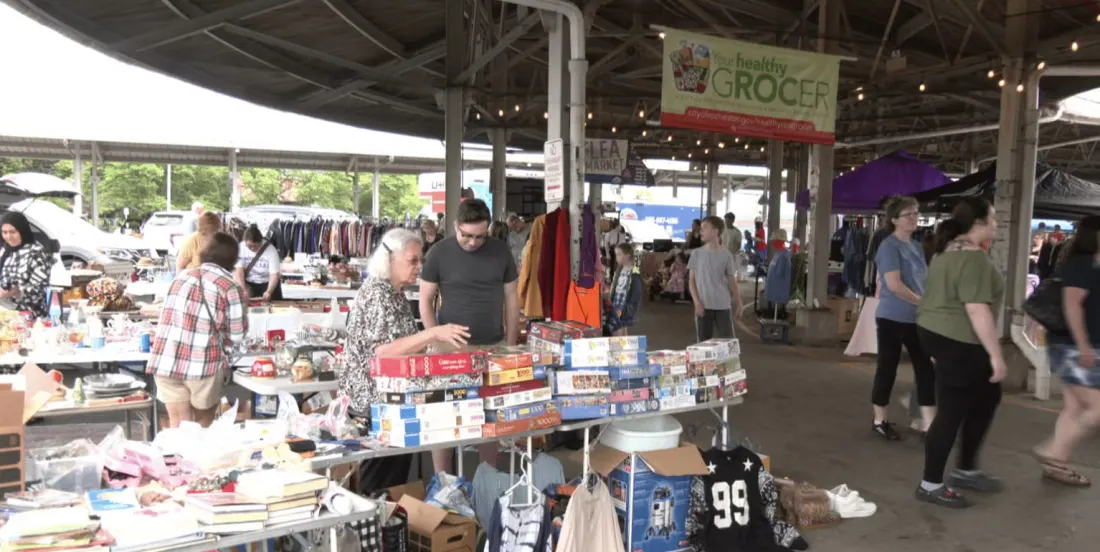 Rows of clothing and collectibles at a past Great NYS Flea market