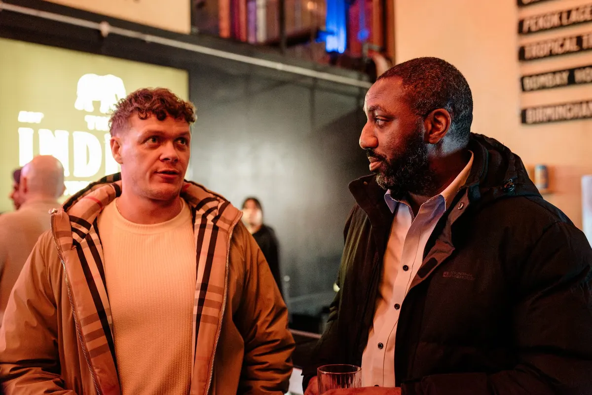 Two property people in conversation at UK Homes Network LIVE Birmingham