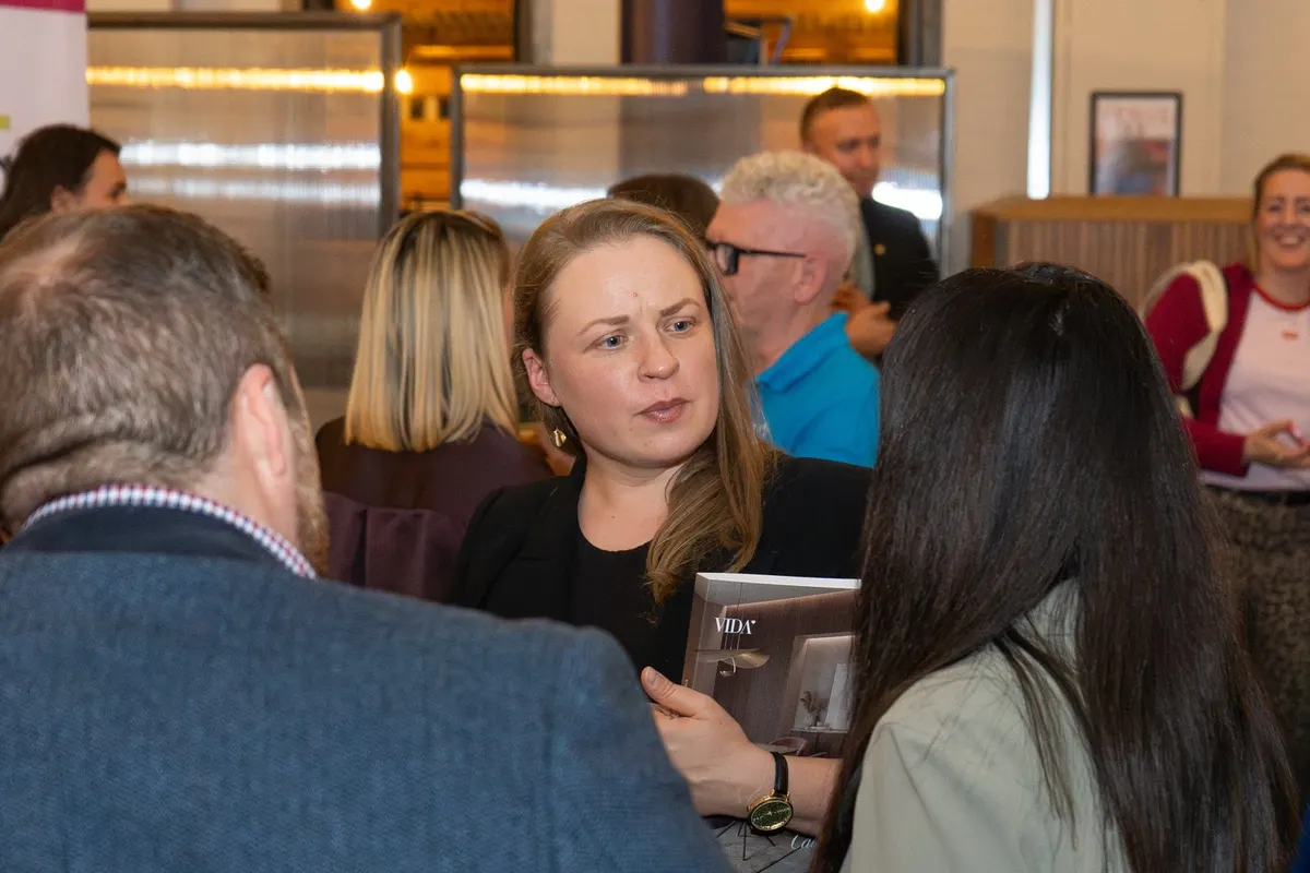 Guests chatting over drinks at UK Homes Network LIVE Leeds