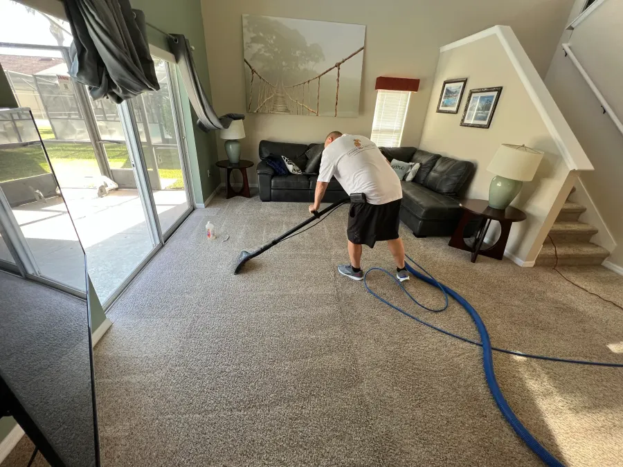 Sahara Carpet Care technician cleaning residential carpet