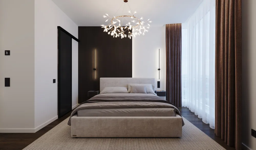 Bedroom with feature lighting and full-height curtains