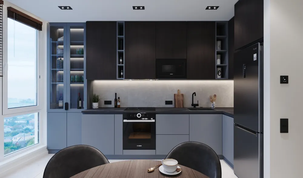 Kitchen with integrated appliances and city view