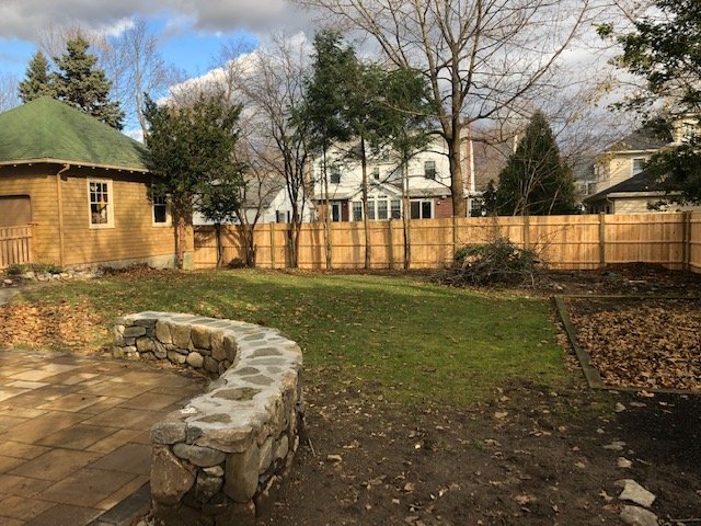 Wood backyard fence by All Fenced In