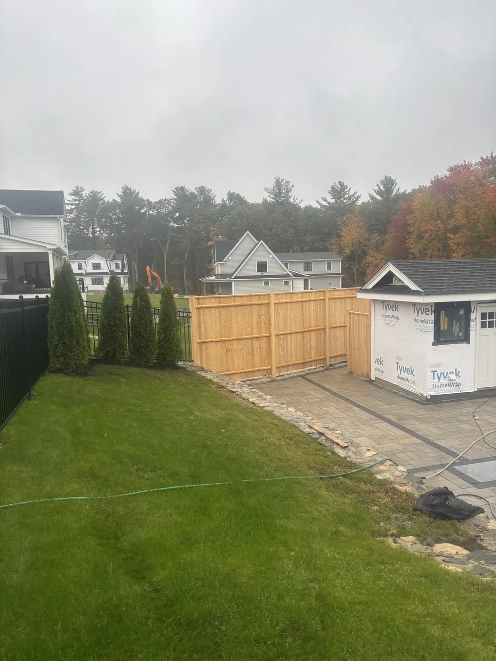 New cedar privacy fence in a backyard by All Fenced In