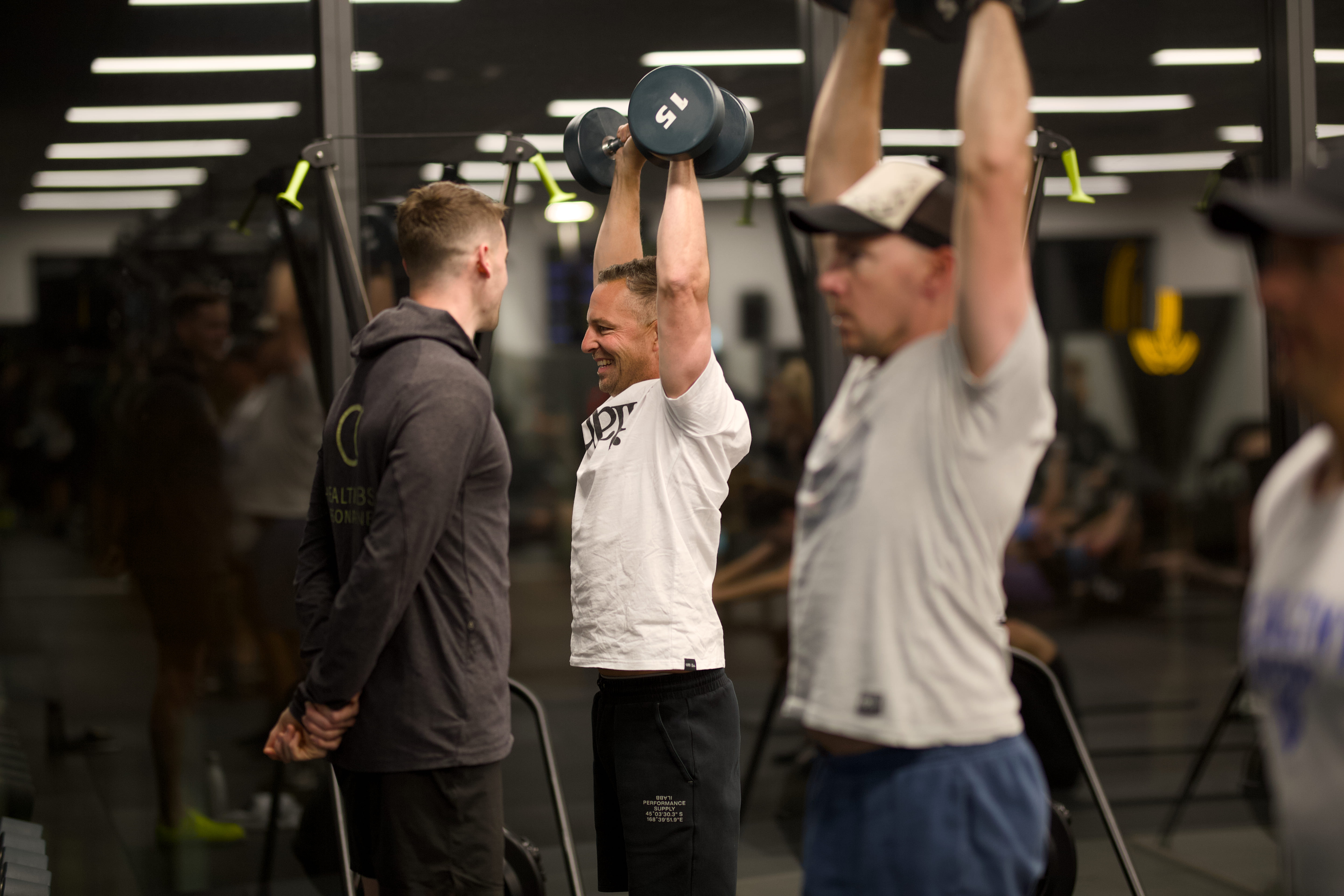 A personal trainer coaching members at OC Health Clubs in Queenstown