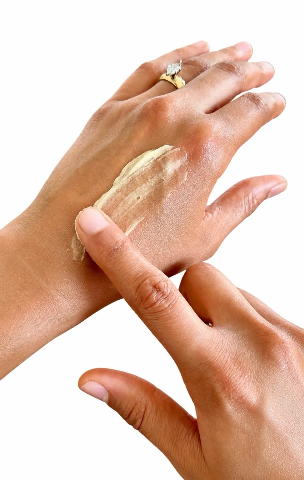 A small amount of tallow balm spread onto the back of a hand