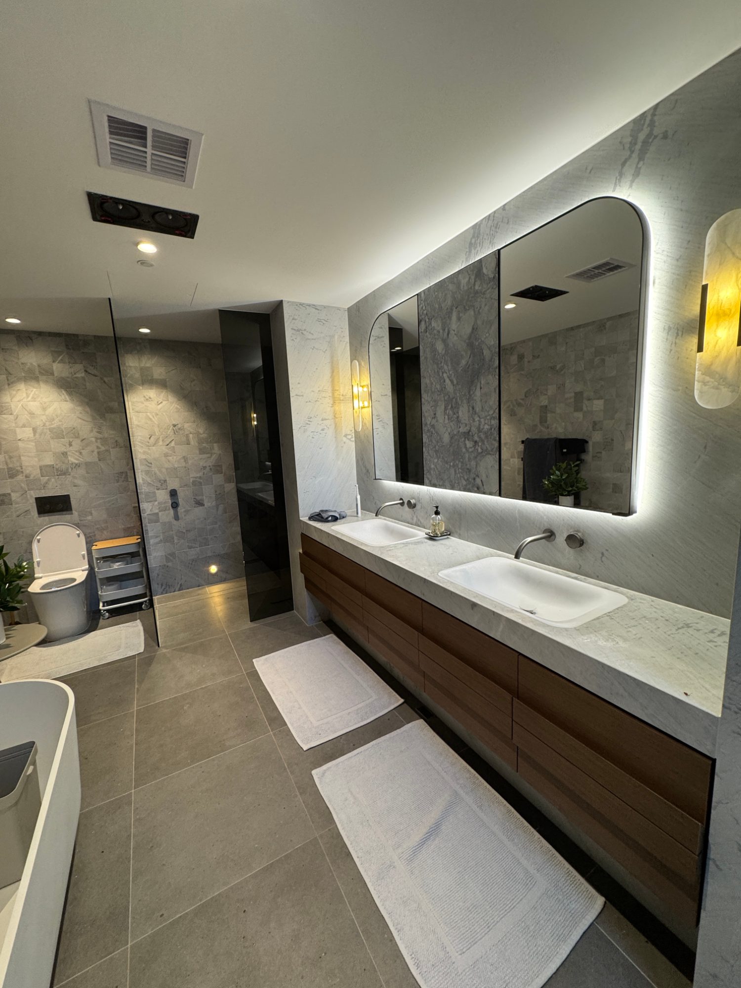 Ensuite with backlit mirror