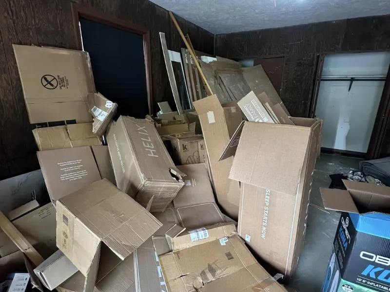 Room full of boxes and clutter ready for junk removal