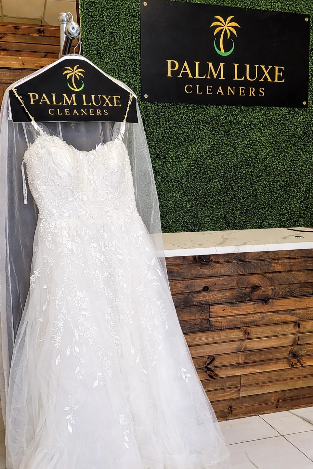 A preserved wedding gown packed in an archival box at Palm Luxe Cleaners
