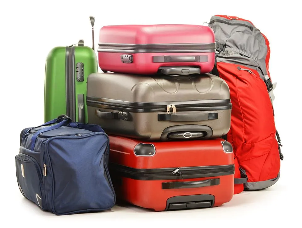 Luggage at the airport curb, ready for a Rockwall Shuttle ride to DFW Airport
