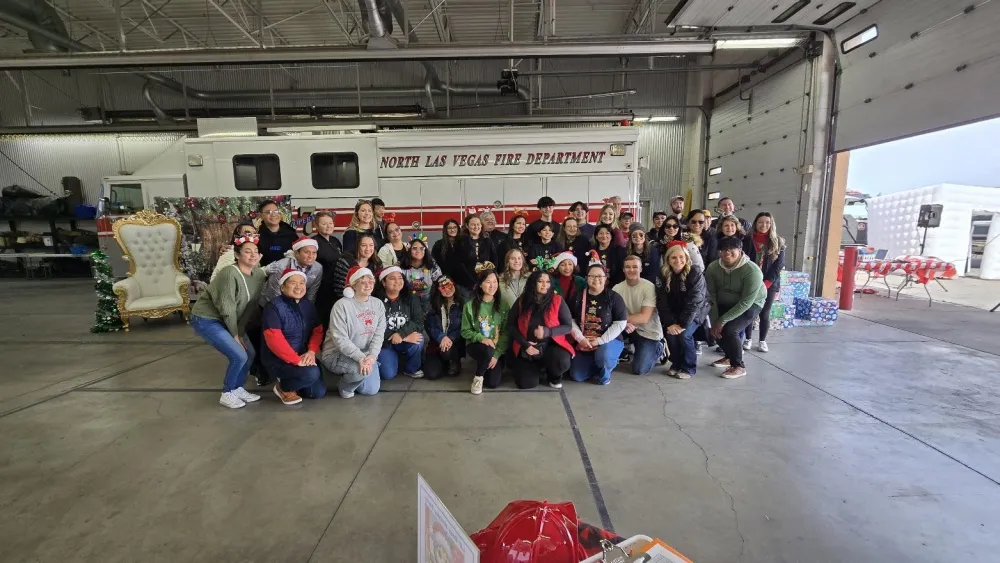 Southern Nevada firefighters with a family they support