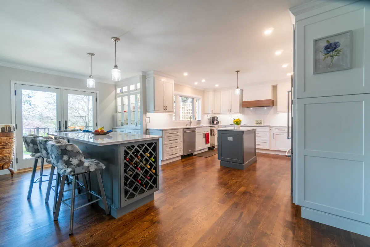 Magnolia main photo — Kitchen and laundry renovation with full cabinetry overhaul, quartz counters, and built-ins.