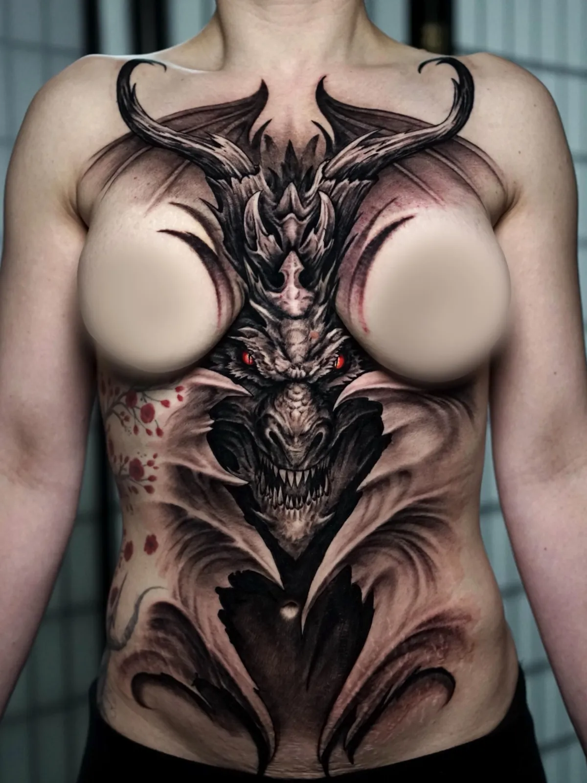 Large custom black and gray tattoo by James Strickland in Missoula Montana