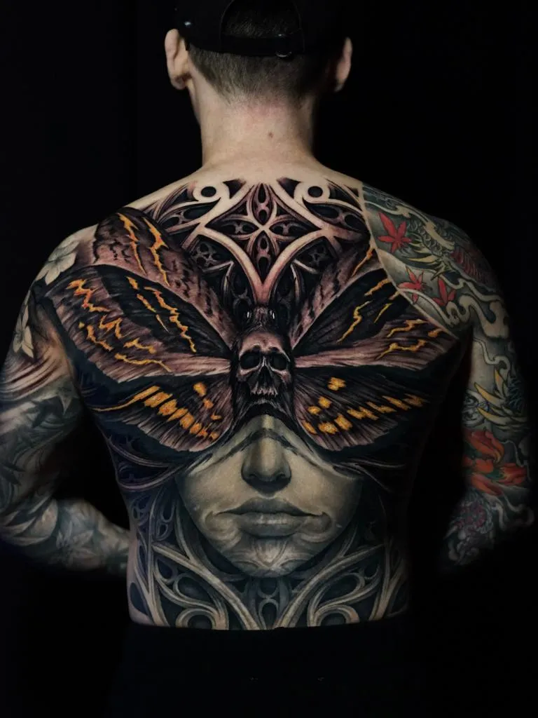 Large moth skull back tattoo by James Strickland at Montana Tattoo Company in Missoula Montana