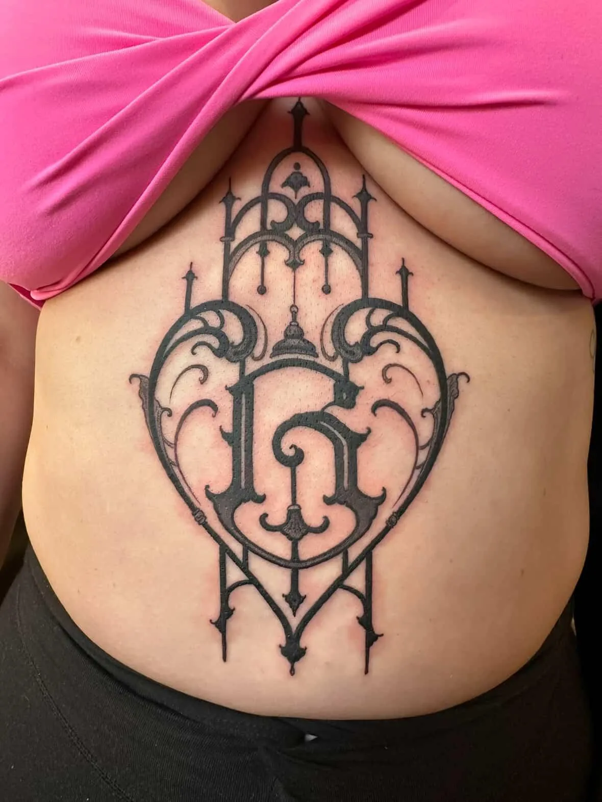 Ornamental blackwork stomach tattoo by Deft Ink at Montana Tattoo Company in Missoula Montana