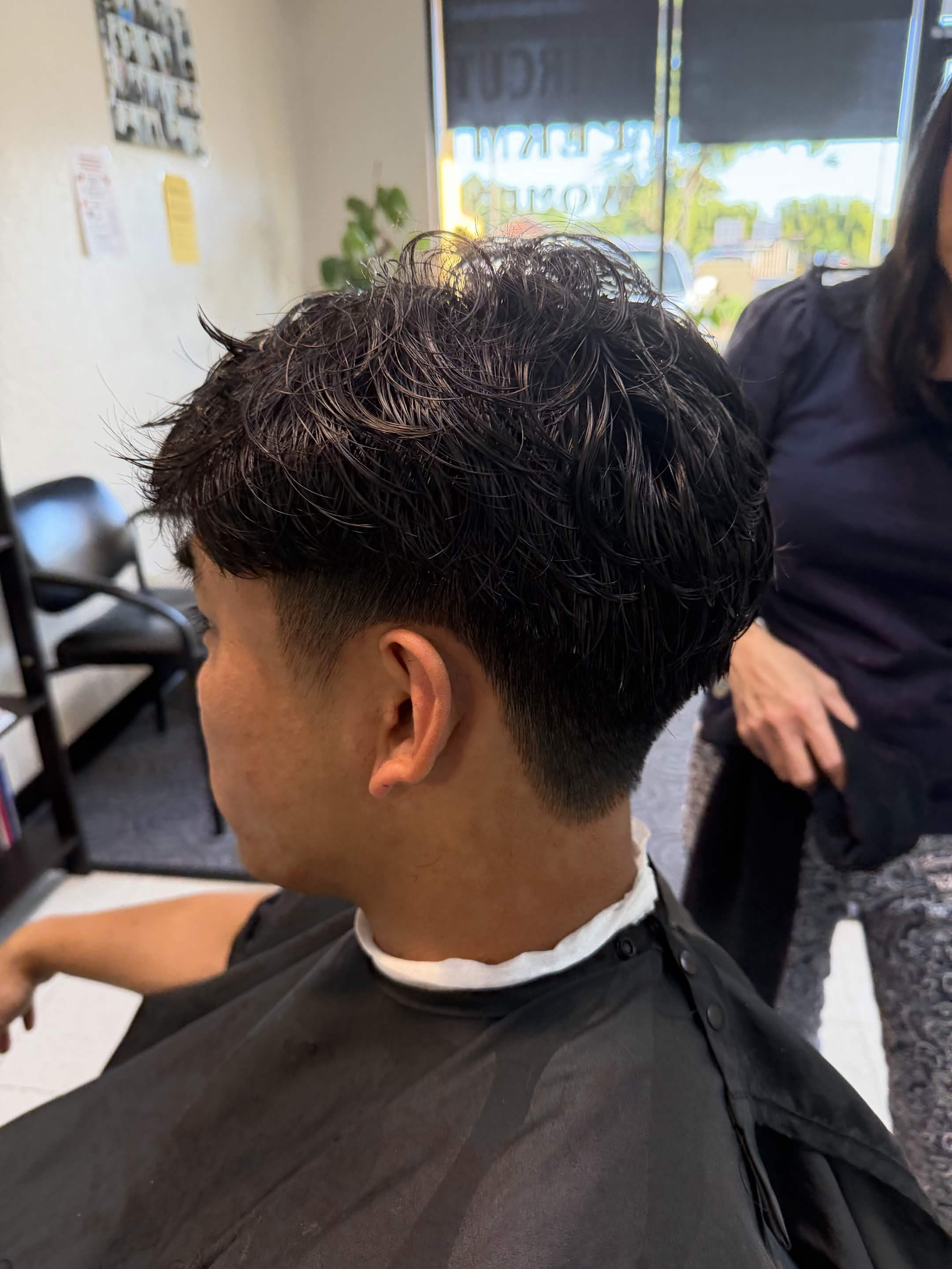 Men’s textured perm with tapered haircut at Silver Star Salon in Sacramento