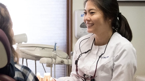 Dr. Hanna Cao speaking with a patient