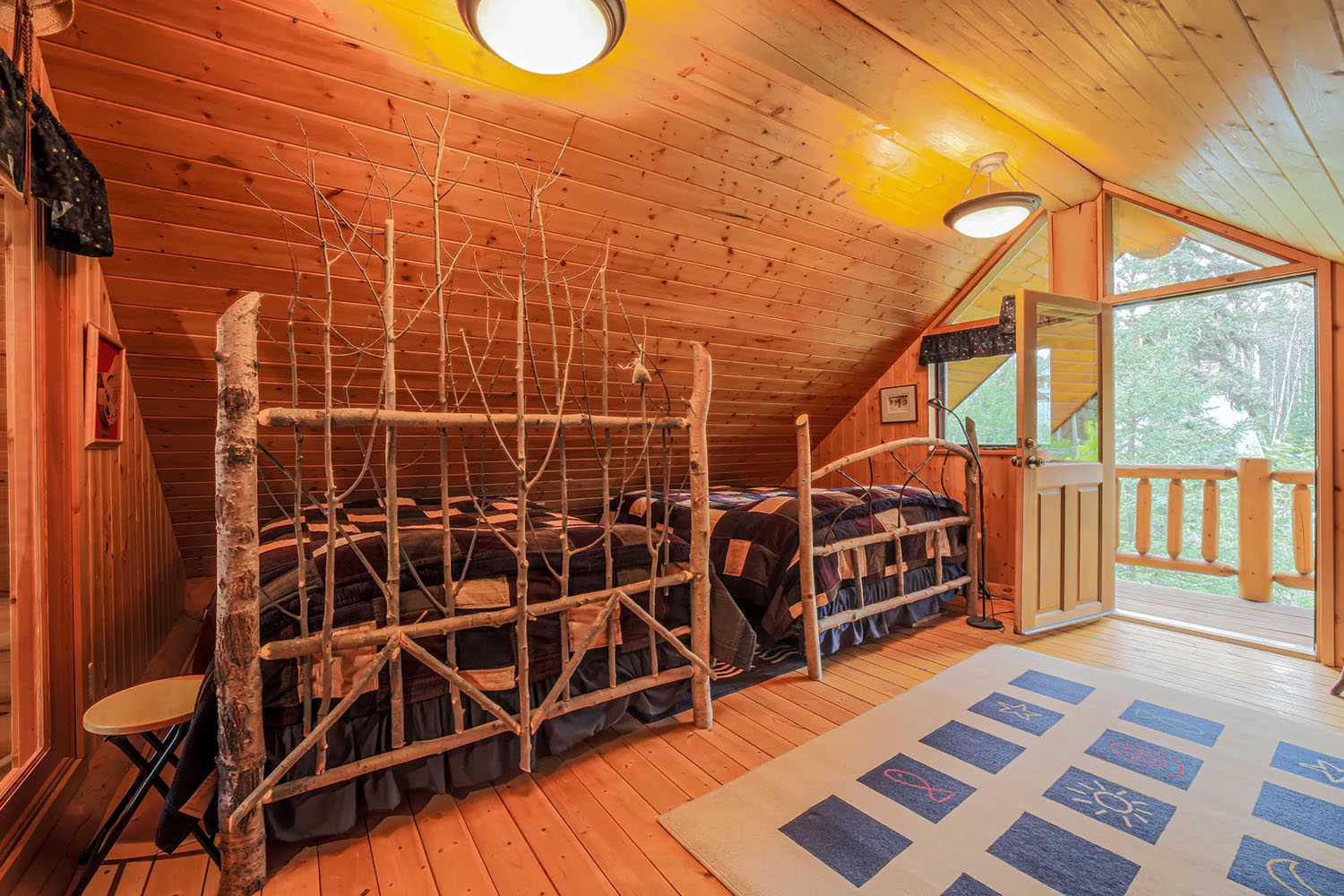 Loft bedroom in River Cabin