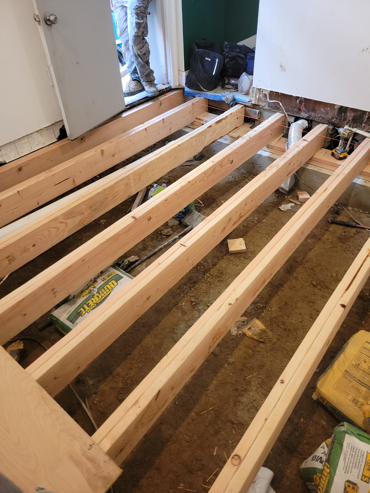 Sagging floor repair framing and joist installation in an older Pennsylvania home