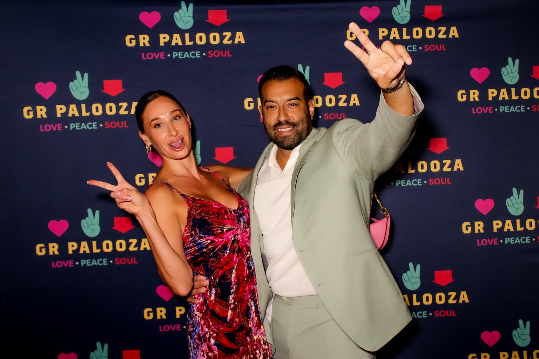 Guests enjoying a branded photo booth at an event