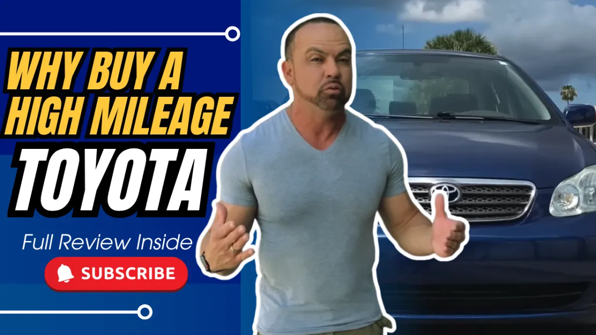 David beside a high-mileage everyday vehicle