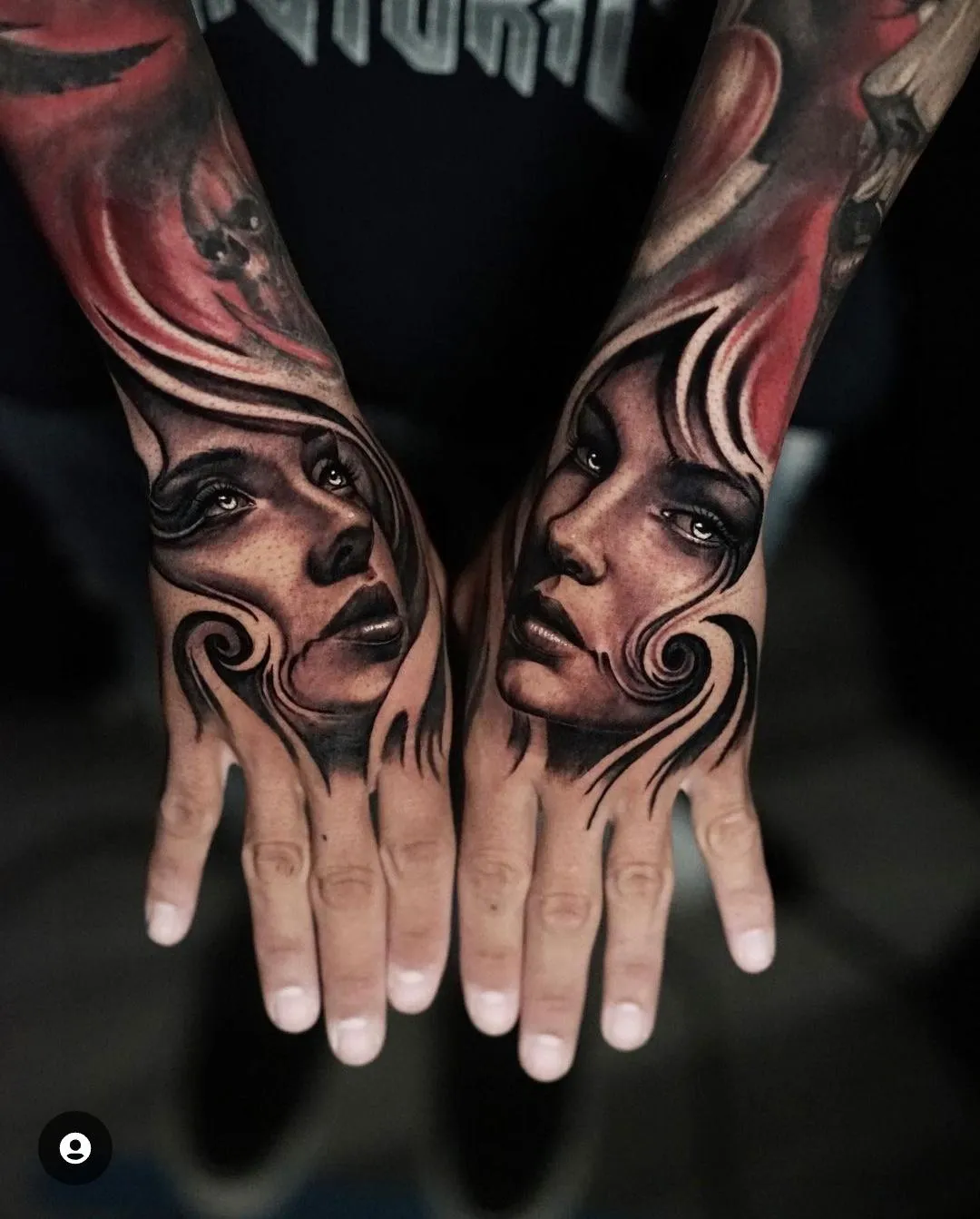Matching black and grey female portrait hand tattoos with flowing abstract forms by James Strickland in Missoula Montana
