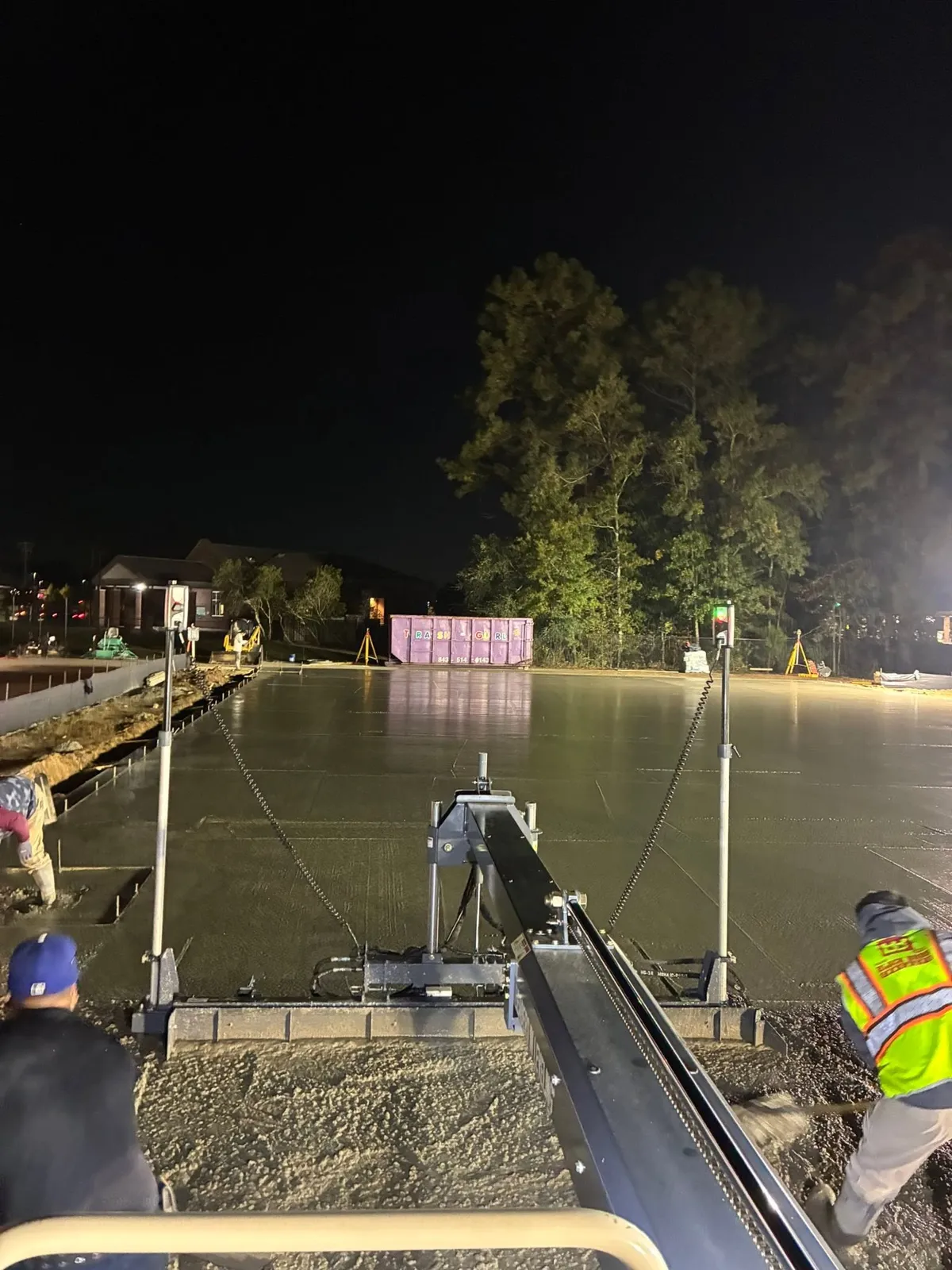 Night laser screed concrete pour with crew - Charleston, SC