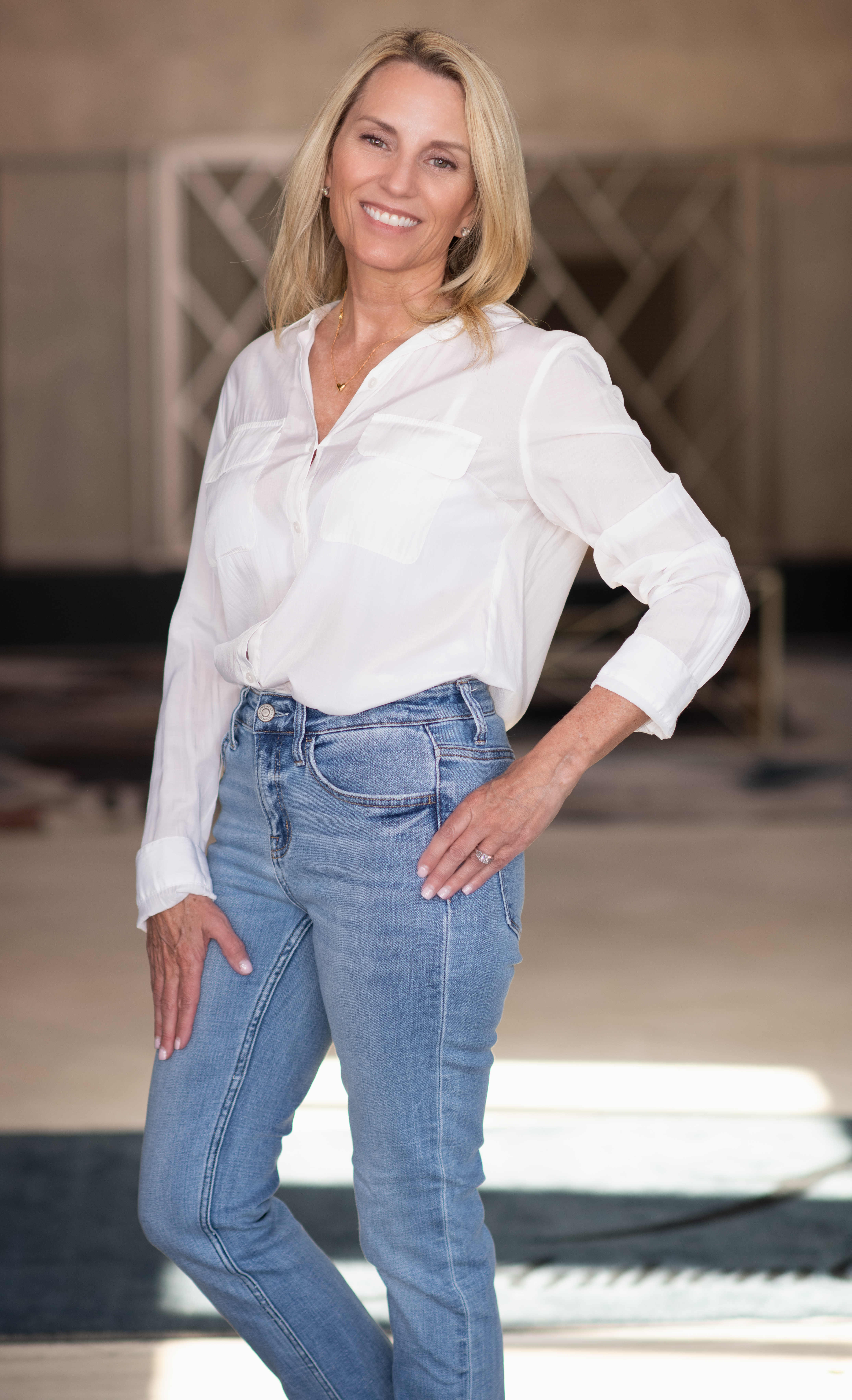 A welcoming suburban home exterior at dusk with warm interior lights, a family car in the driveway, soft natural sky tones, balanced composition and crisp depth — illustrating homeownership possibilities.
