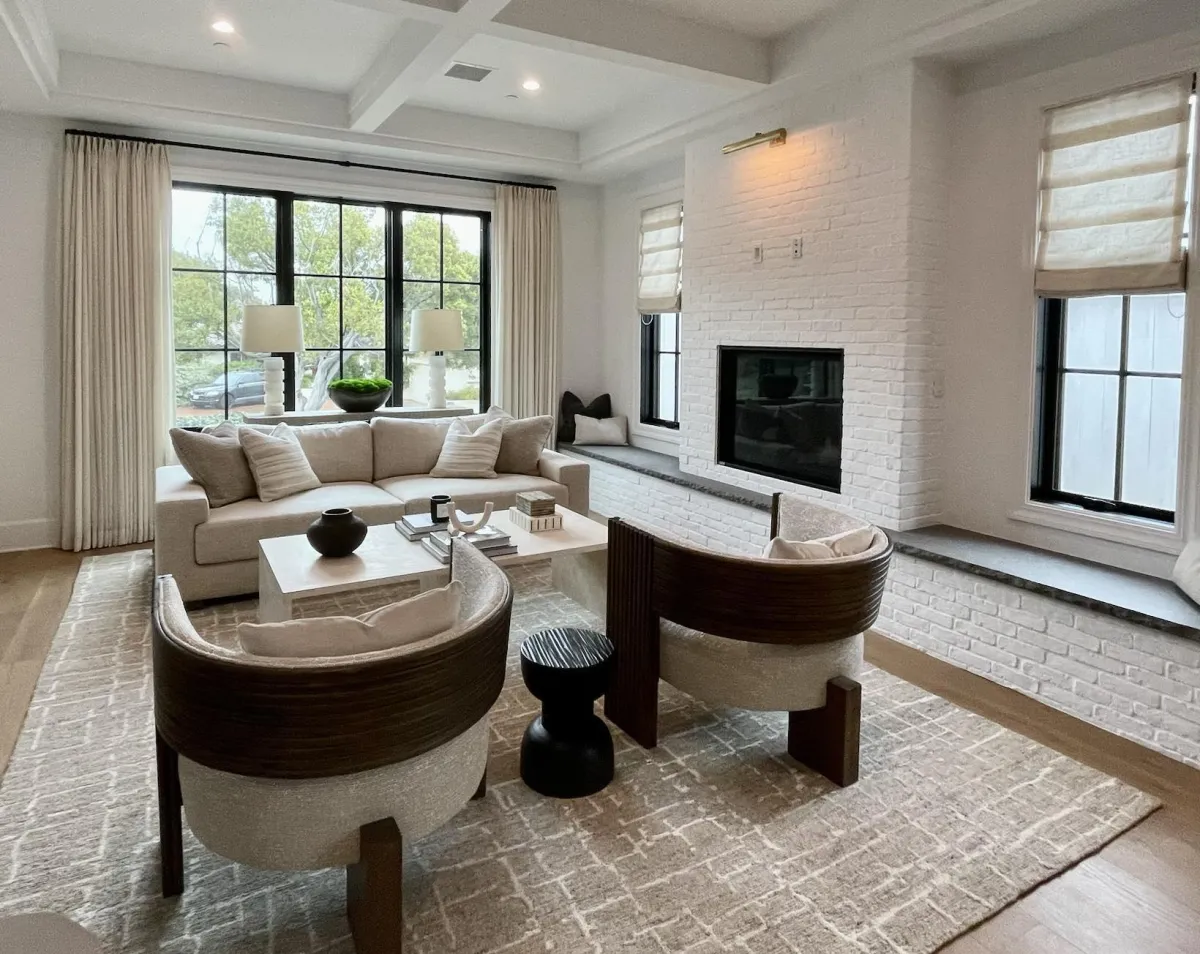 Custom drapery and Roman shades installed in a Beverly Hills luxury living room
