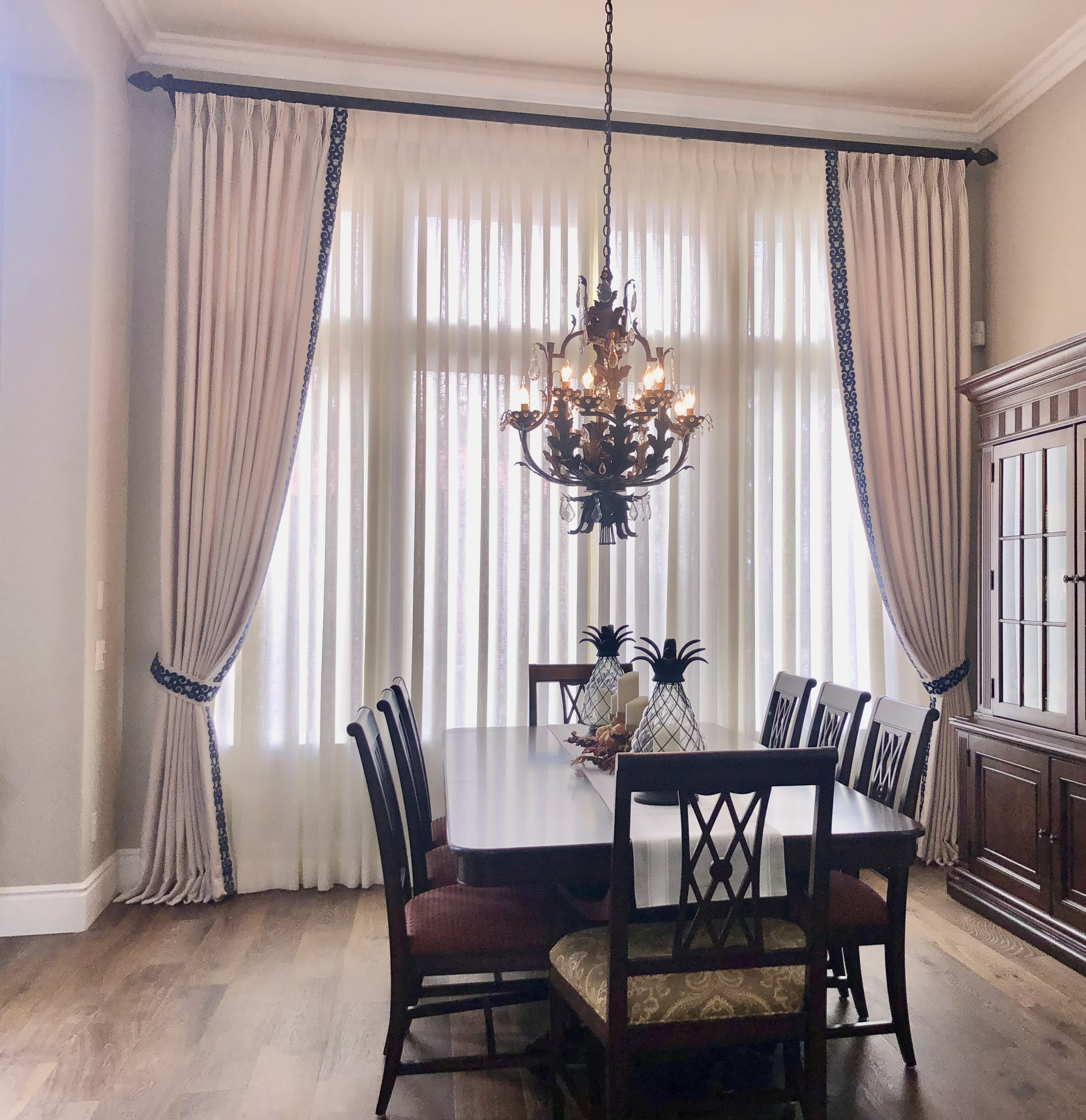 Elegant custom drapery installed in a formal dining room
