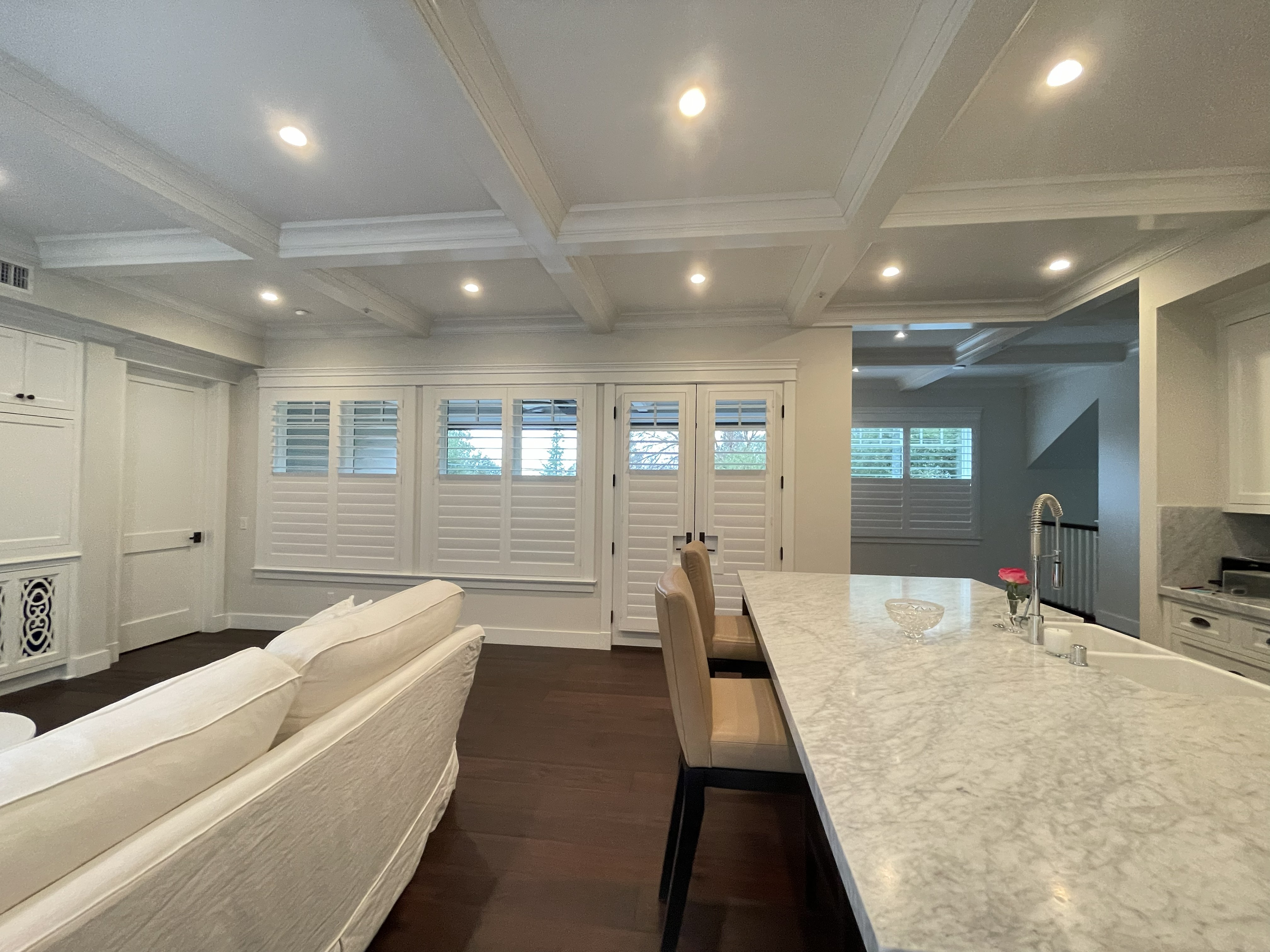 Plantation shutters installed in a Pacific Palisades open concept home