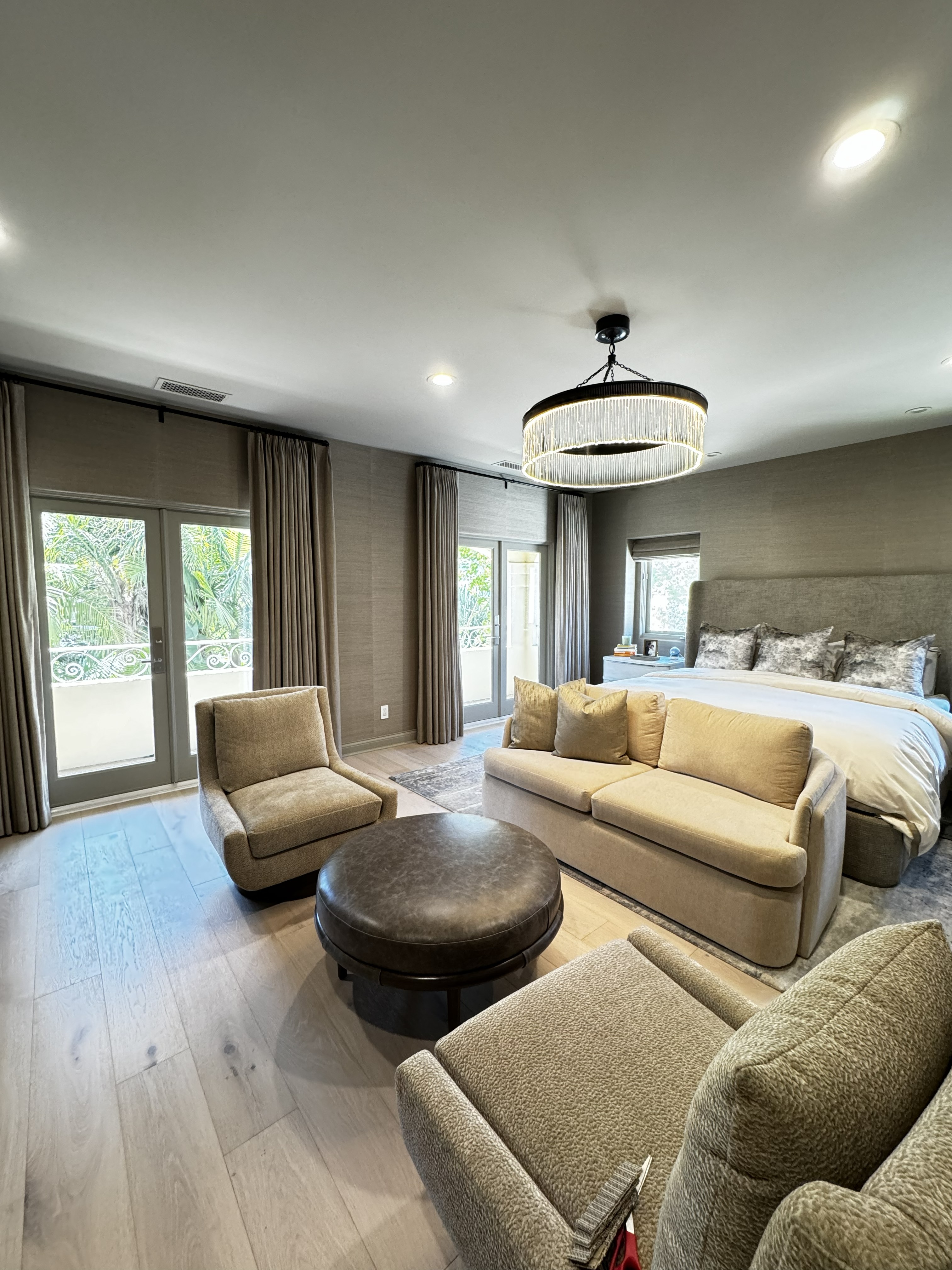 Motorized window treatments installed in a modern luxury living room