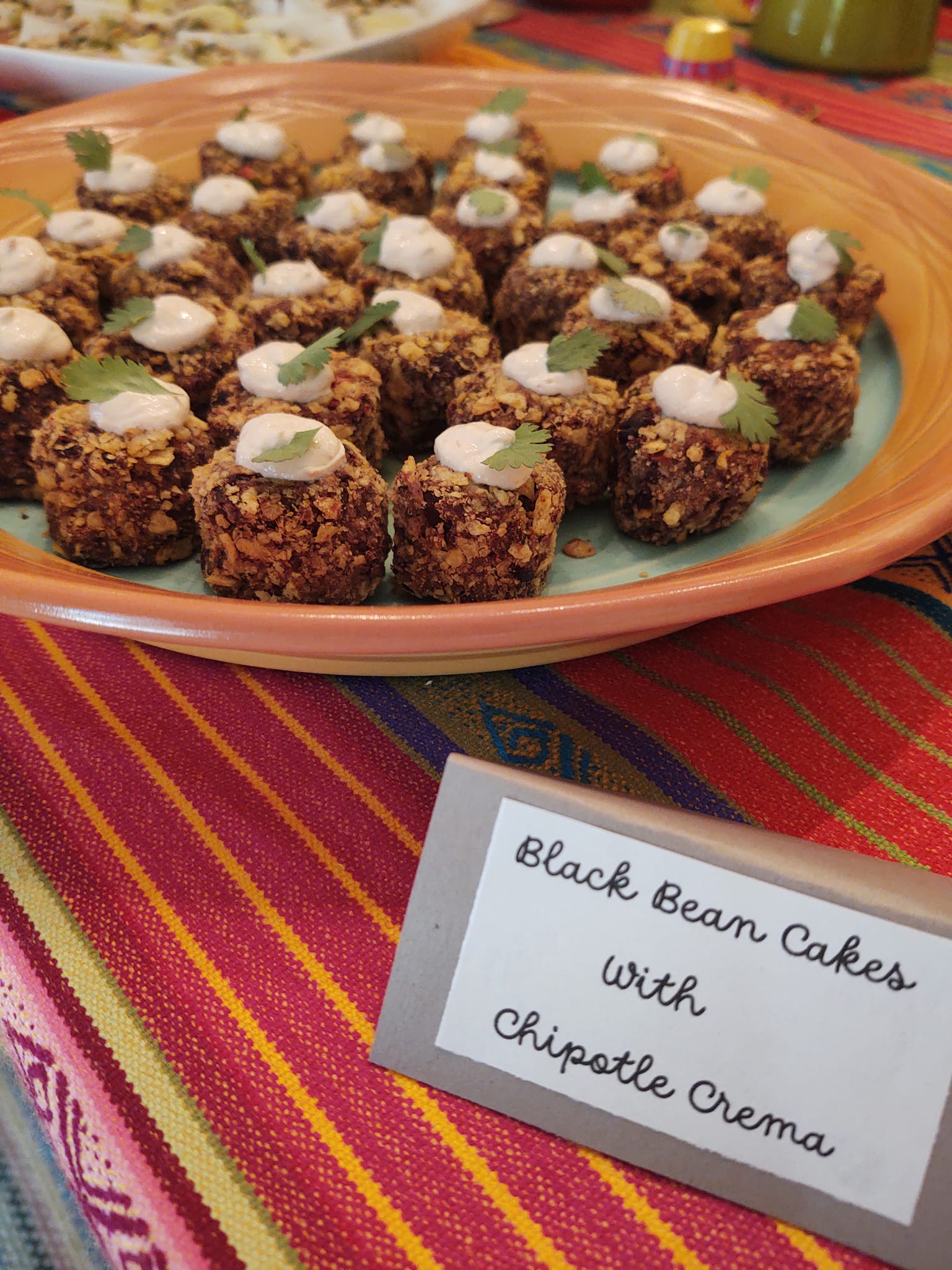 Black bean cakes with chipotle sauce appetizer served at a Foodie Call private catering event