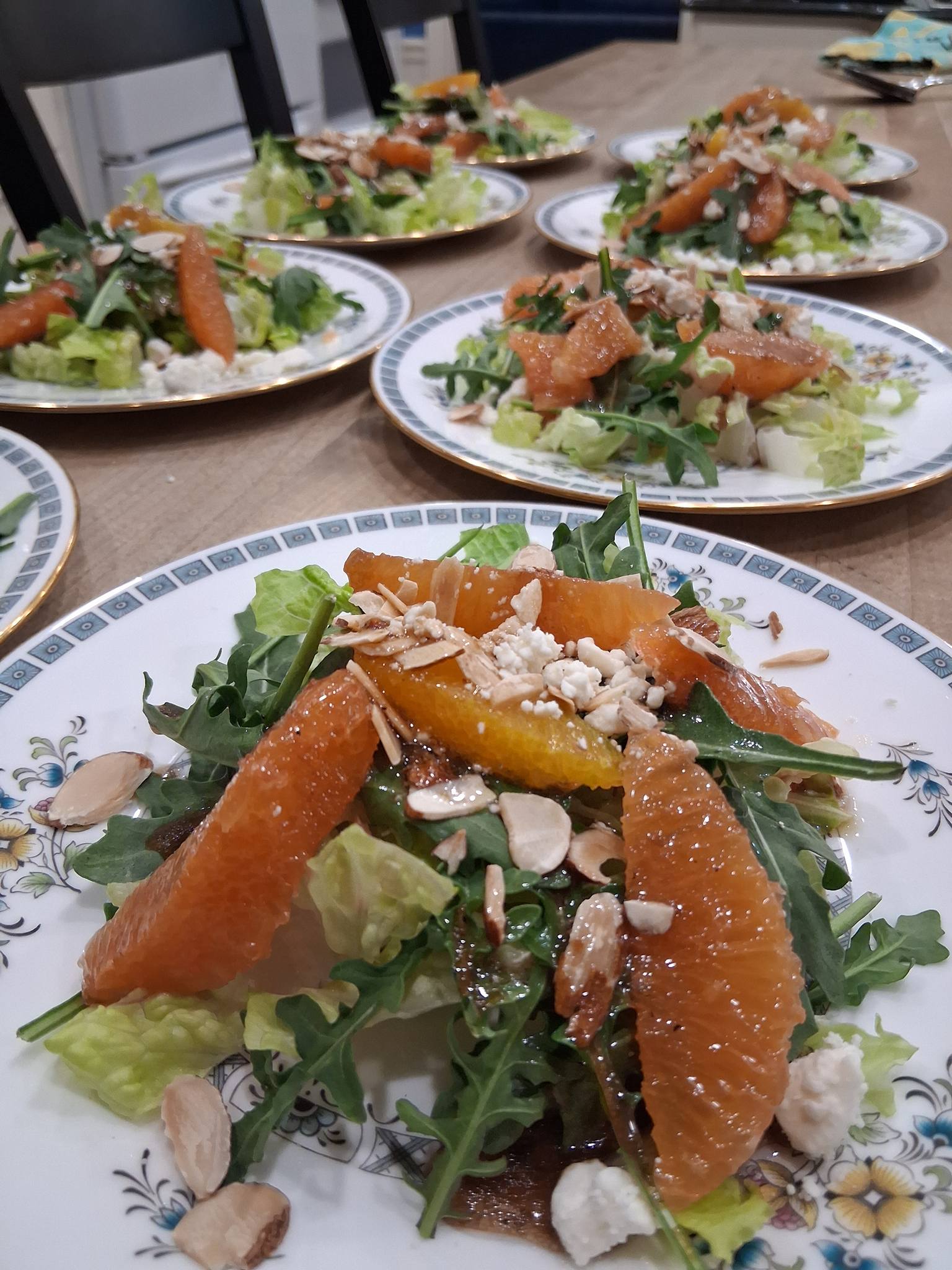 Fresh citrus salmon salad plated for an upscale private dining and catering experience by Foodie Call
