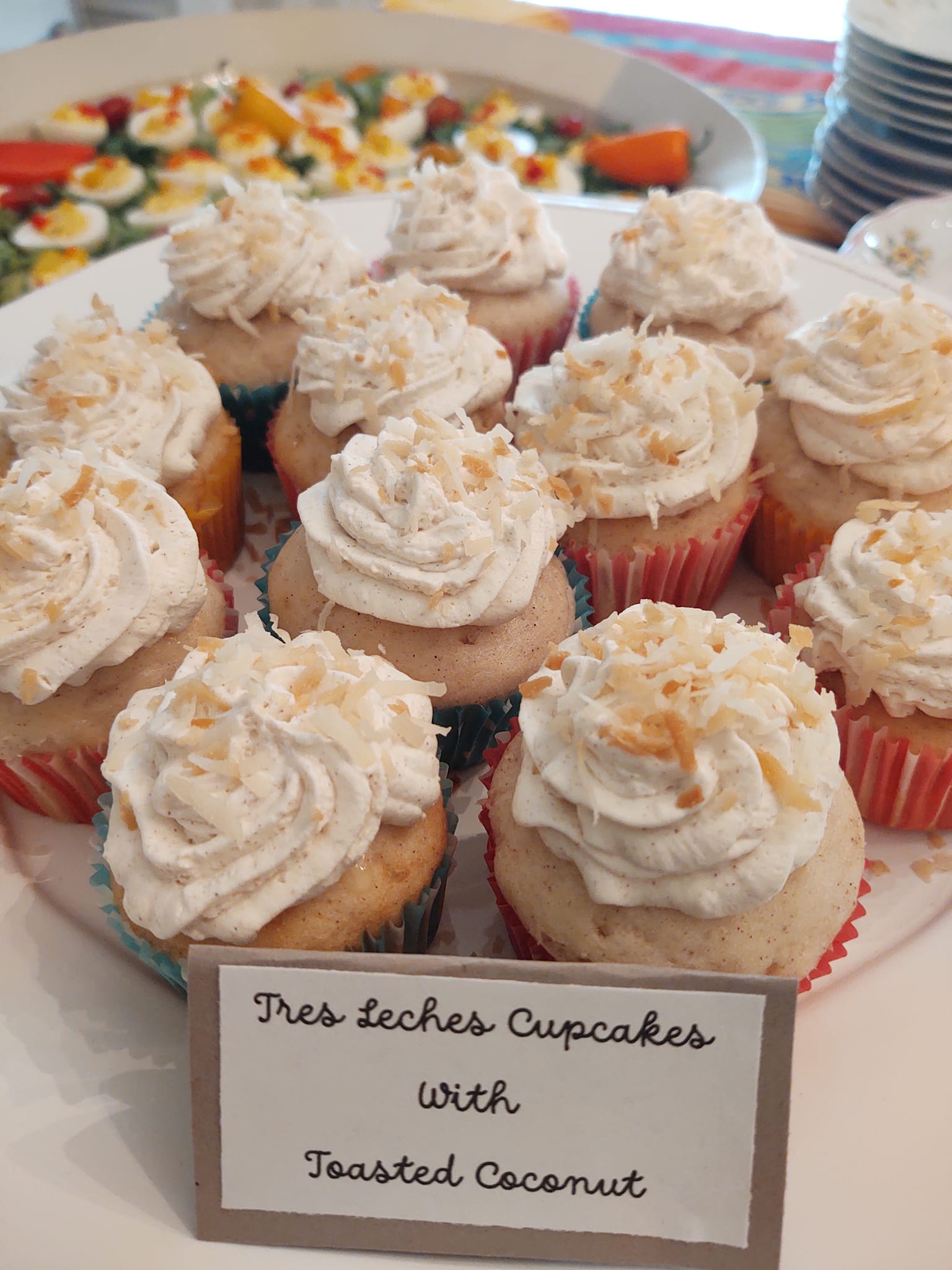 Tres leches cupcakes with whipped frosting handcrafted by Foodie Call dessert catering