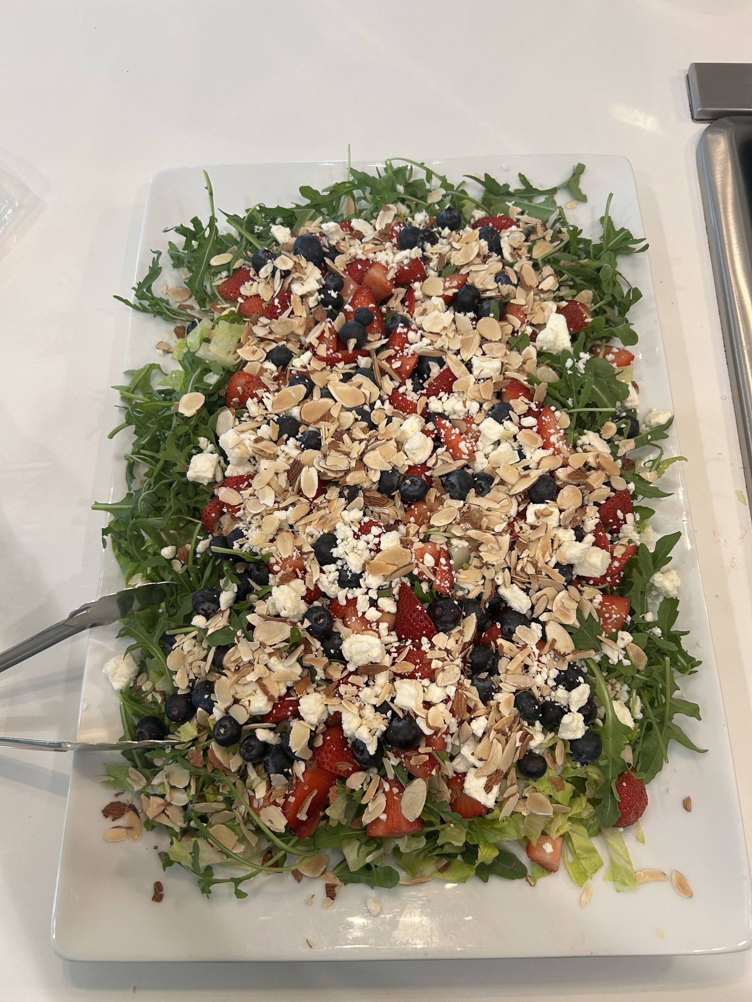 Mediterranean-style chopped salad platter with feta cheese and fresh vegetables by Foodie Call