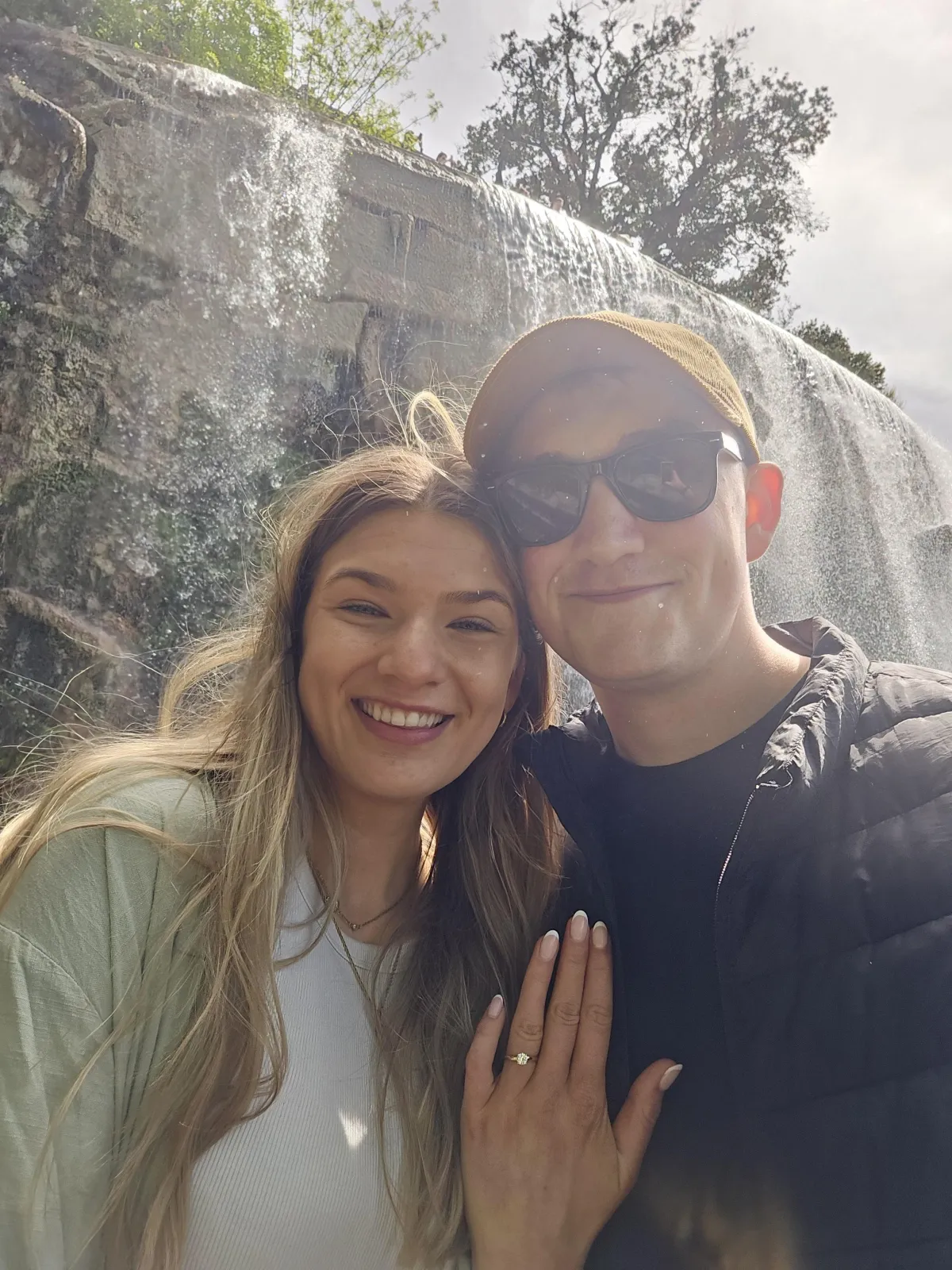 a three tiered wedding cake on a table