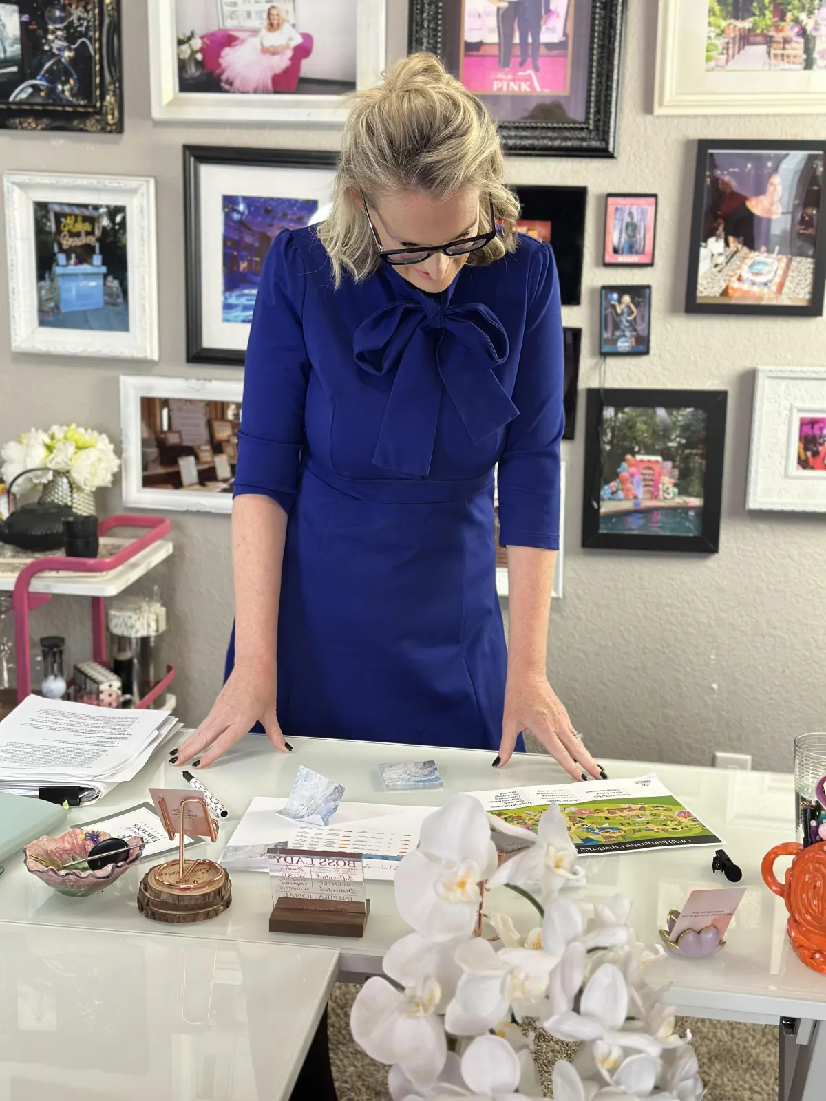 Corporate event planner reviewing budget proposal with executive team