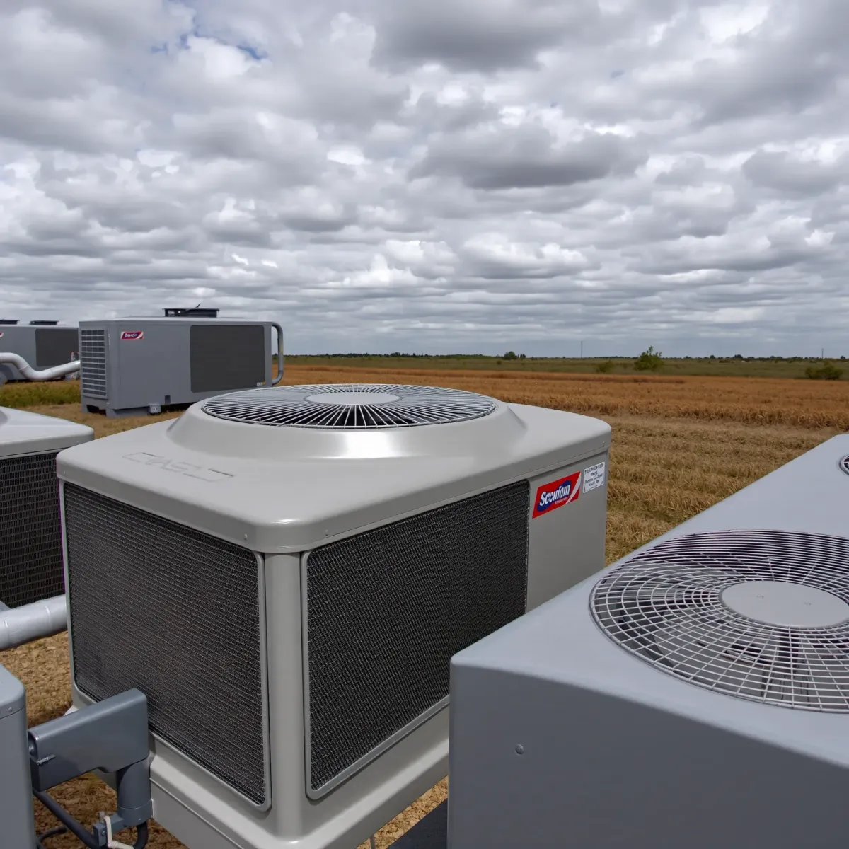 HVAC equipment in Rendon, TX, set outdoors with ducts, vents, and electrical components in a detailed, realistic scene.