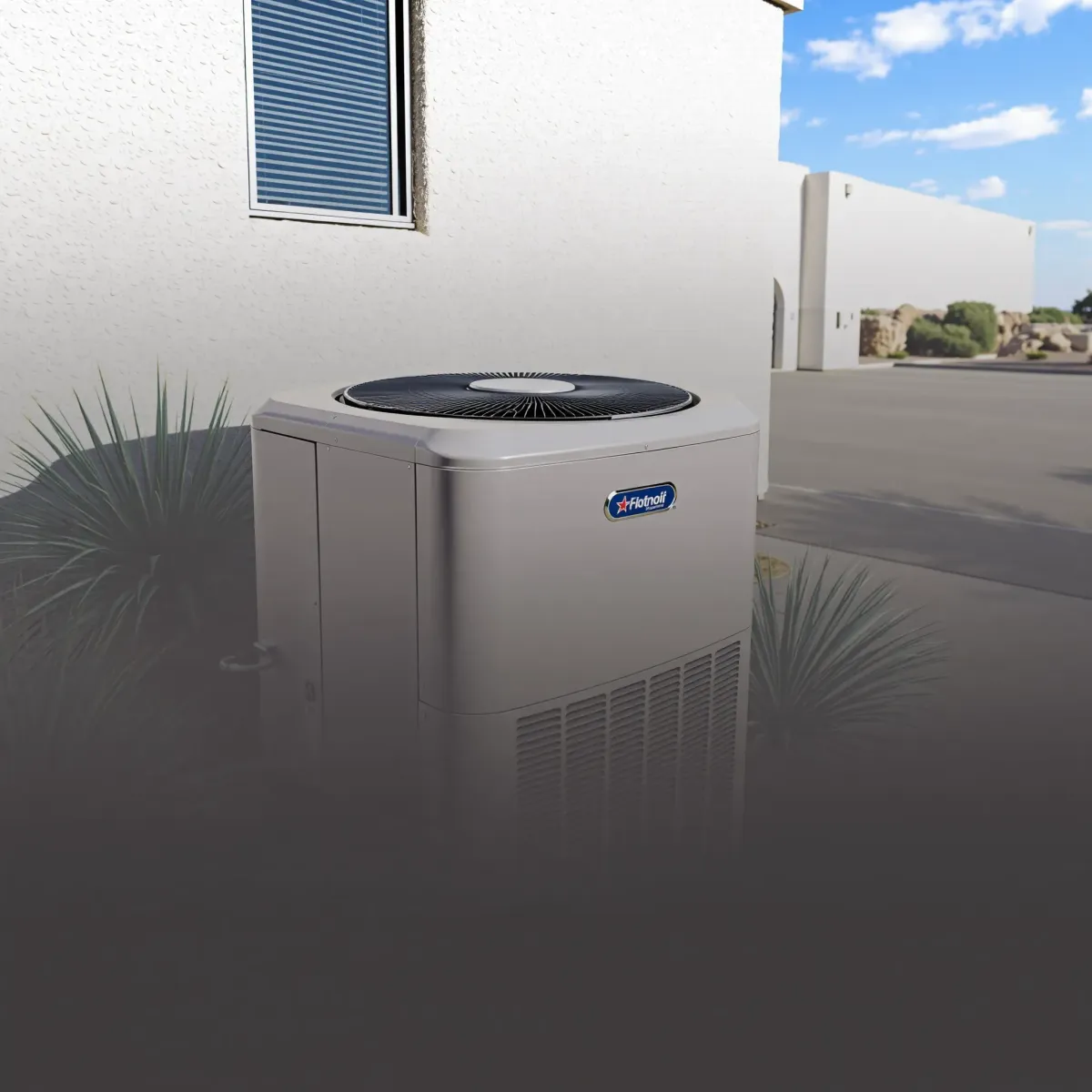 Recently installed outdoor HVAC unit in a lush backyard with patio, greenery, clear sky, showcasing professional craftsmanship.