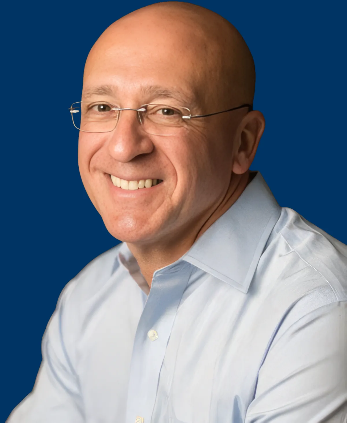 a dental room with a chair and a monitor
