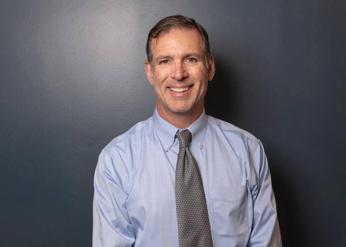 Dr. David Allen portrait in helping patients in Omaha NE.