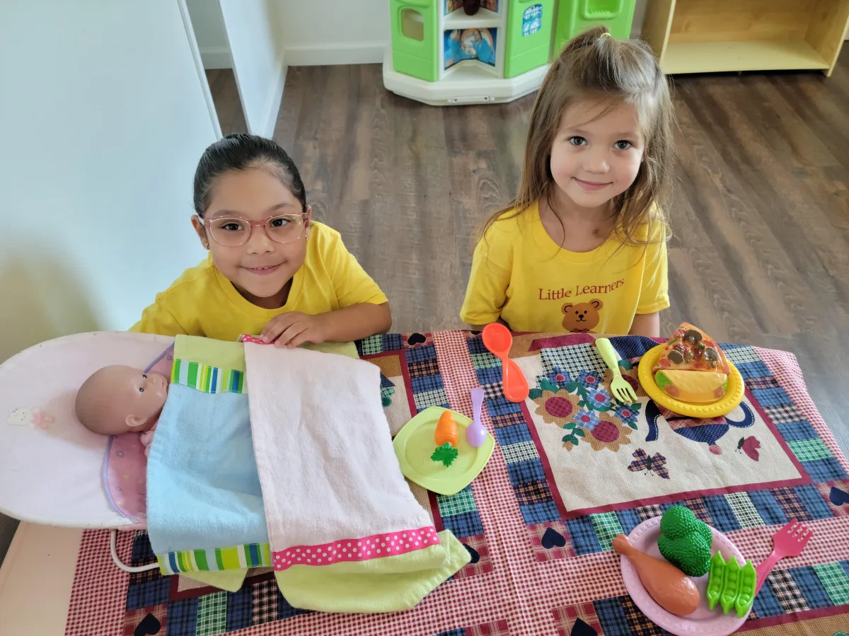 Girl follows directions during arts and crafts time.