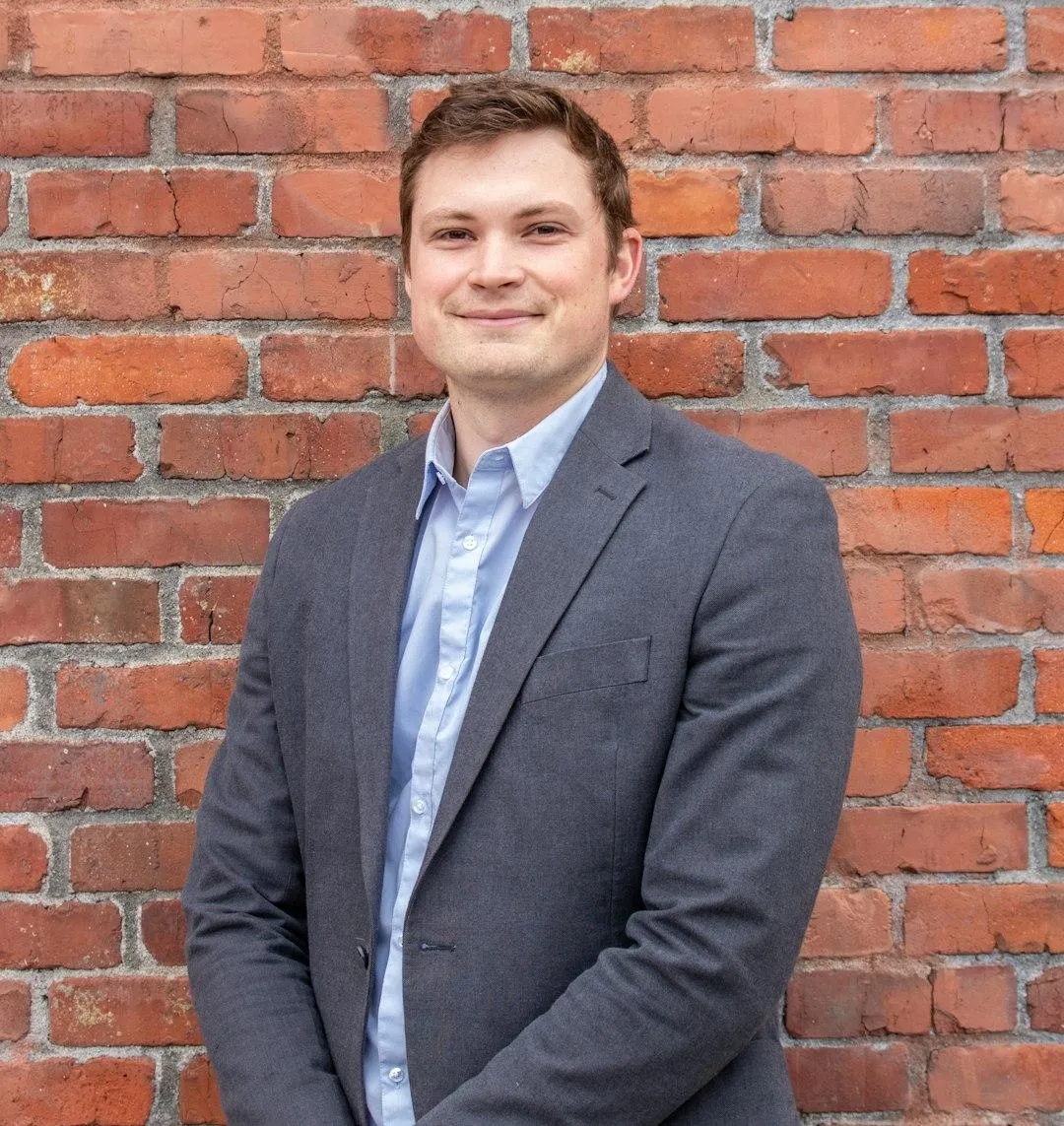 Headshot of Michael H., a residential client of R.CS Contractors of Illinois, delighted with their bathroom renovation project.