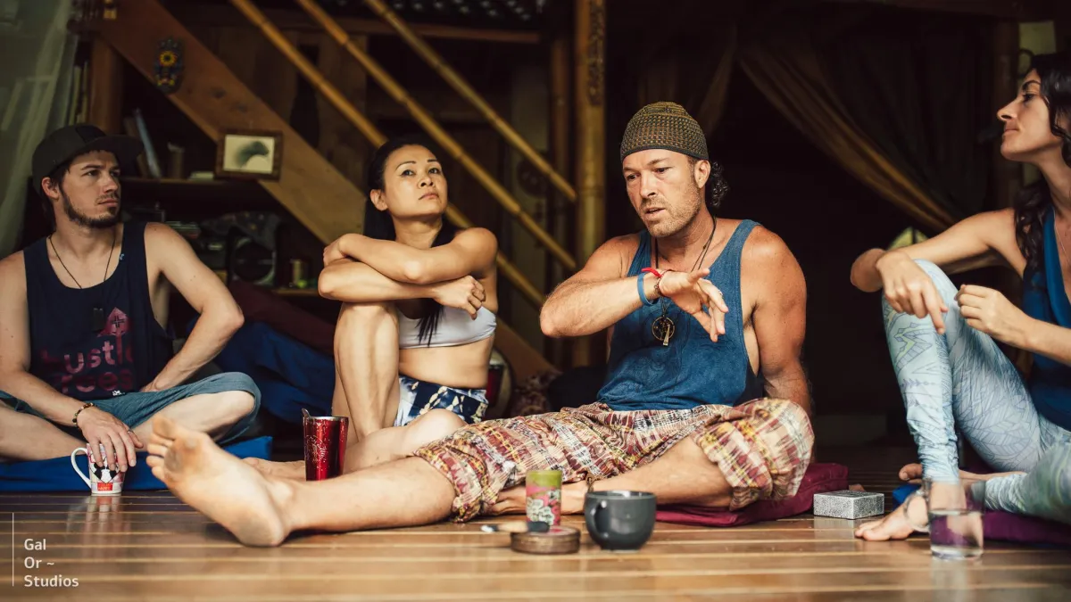 an aerial view of a lighthouse and the ocean