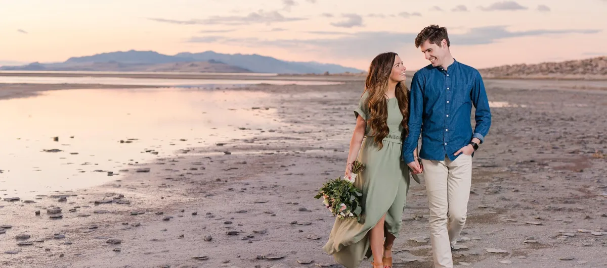Antelope Island proposal at Great Salt Lake with sunset over wate